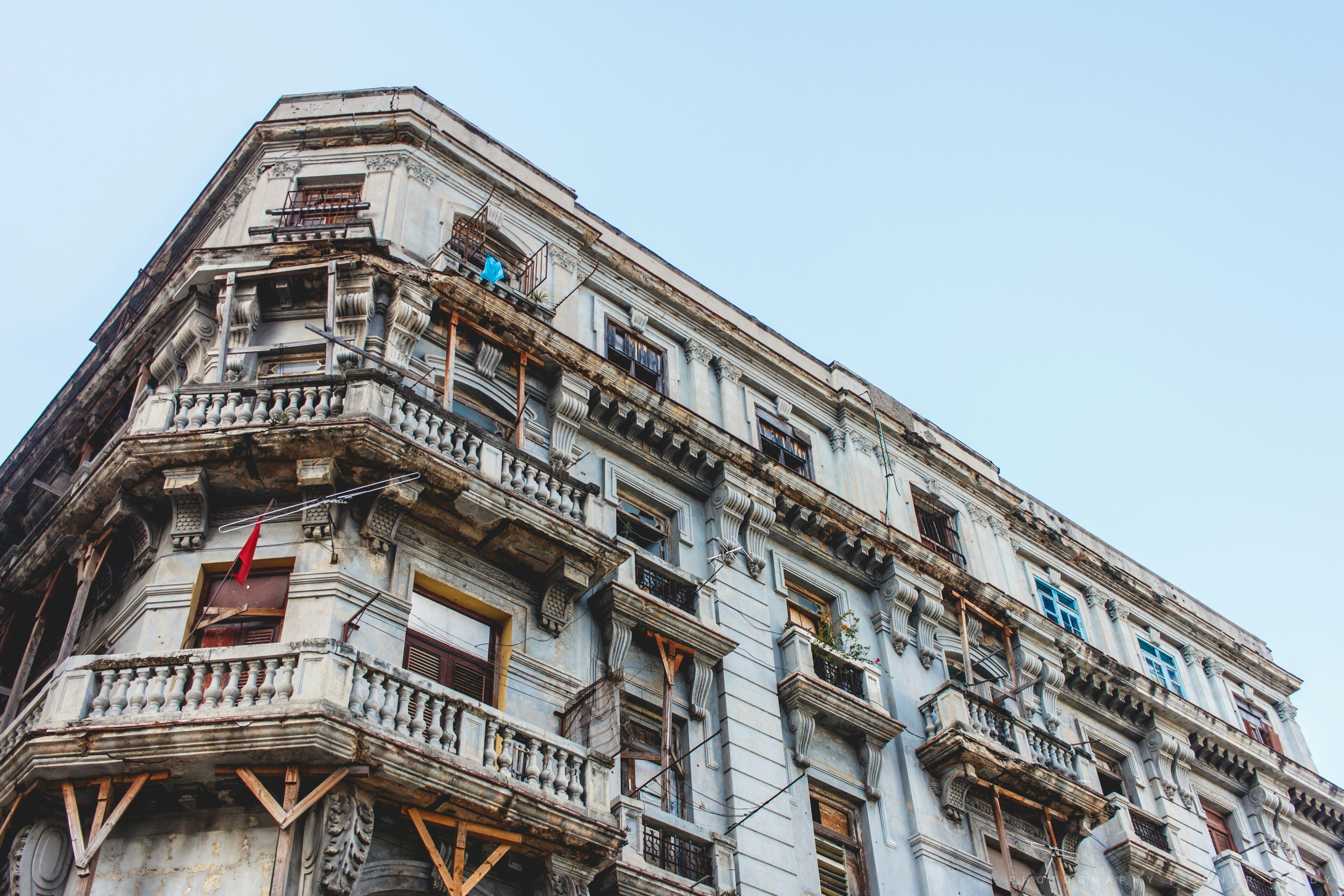 concrete building with balconies during day